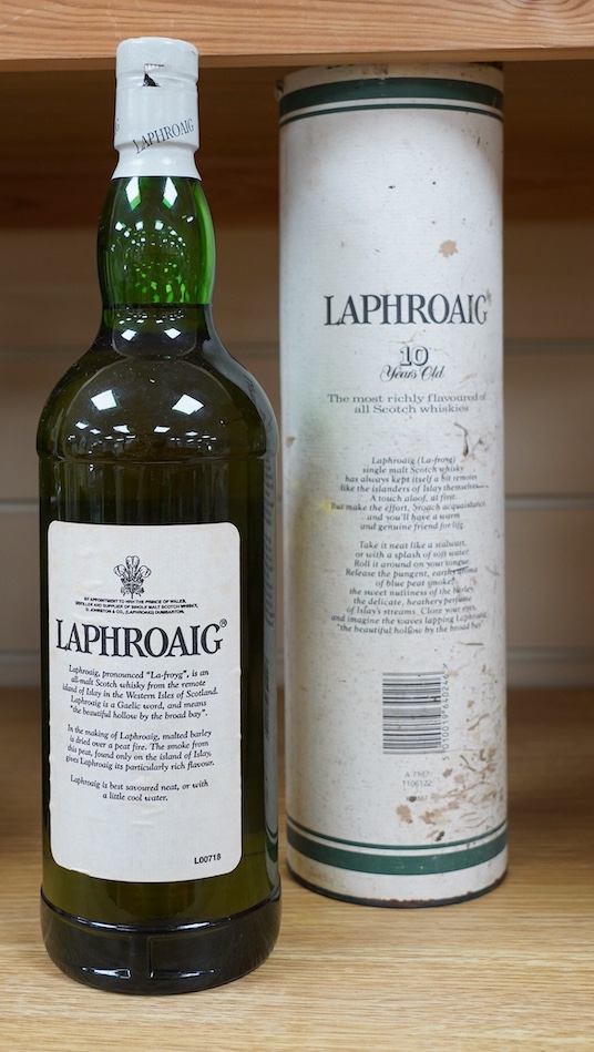 A cased 1lt bottle of Laphroaig Single Islay Malt Scotch Whisky, 10 Years Old. Condition - good, some staining to case